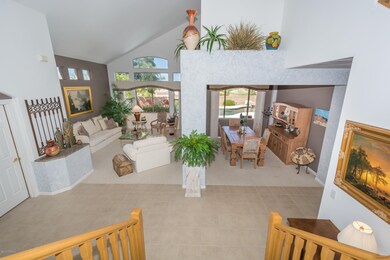 Staircase View of Living and Dining Rm