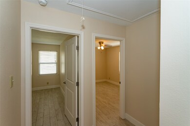 End of hall, view of 2nd bedroom and primary
