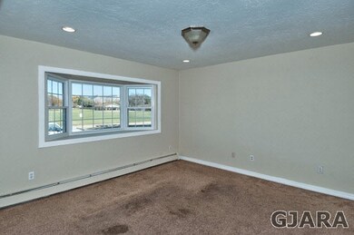With 2,016 square feet and three living areas, thi