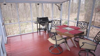 Inside screened in porch.