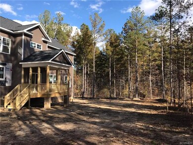 Back view of screened in porch and large private b