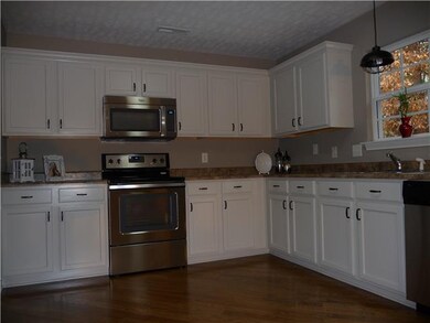 Kitchen has Lots of Cabinets, Pantry and New SS Appliances