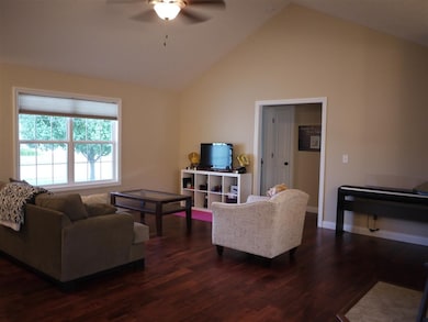 Great room with cathedral ceiling is spacious and 