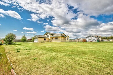 Front of home and yard