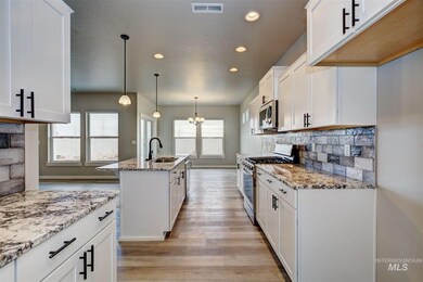 8371 E Stone Valley St, Nampa, ID 83687 - photo 6