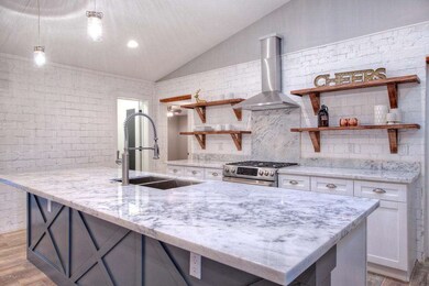 Custom shelves and exposed brick