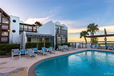 View of pool at dusk