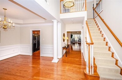 Foyer from the front door with wood floor