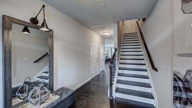 Stairway.  All photos of another home.  Finishes will vary.