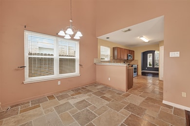 Breakfast area that flows directly into the kitchen.