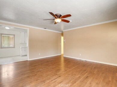 Good sized living room, Original Wood floors.