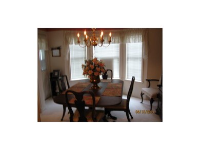 FORMAL DINING ROOM. ALMOST NEW CARPETING THROUGHOU