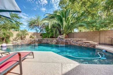 Pebble Tech Pool with Waterfall