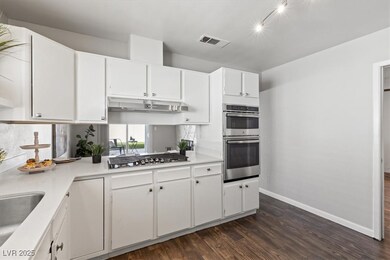 Kitchen with appliances with stainless steel finis