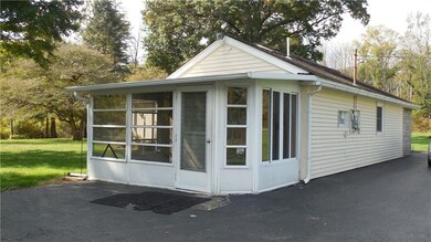 Driveway view of exterior