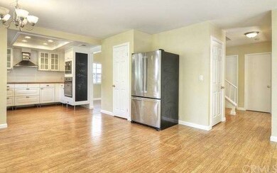 views of the kitchen, breakfast nook and lower hal