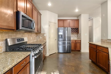 Kitchen with recessed lighting, light stone count