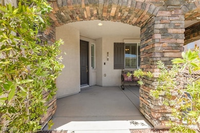 Entrance to property with stucco siding