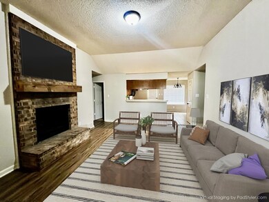 Living room featuring dark hardwood / wood-style f