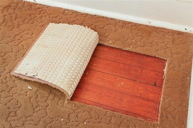 What GORGEOUS wood floors under this carpet - anot