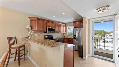 Kitchen featuring appliances with stainless steel 