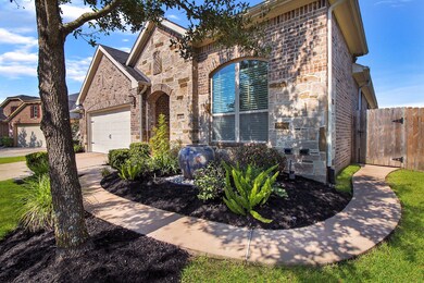 Walkway that wraps around from the driveway, porch