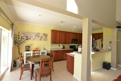 Kitchen with eating space and breakfast bar is open to great room.