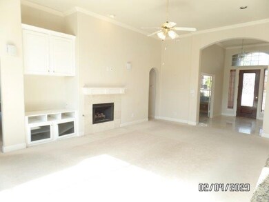Spacious den is open to the kitchen with breakast 