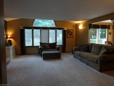 The Family Room opens into the kitchen eating area