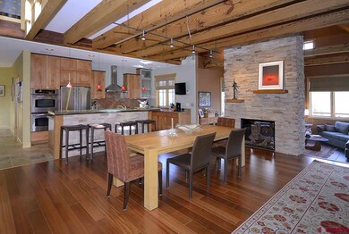 Entertainment area with dining room and kitchen in