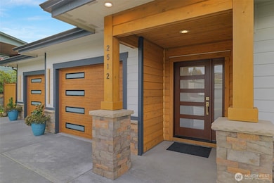2 car garage with storage space. Two EV charging ports, making it easy to charge electric vehicles at home.