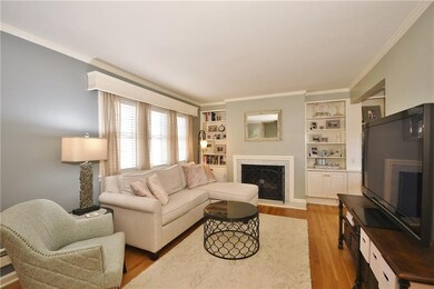 Working fireplace flanked with built in shelving u