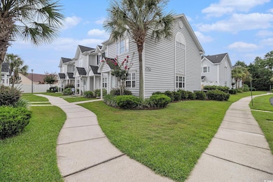 View of side of home featuring a residential view