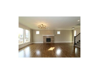 Gleaming Hardwood In Great Room. Designer Carpet O