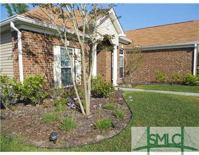 Exterior Front. Well maintained front yard.