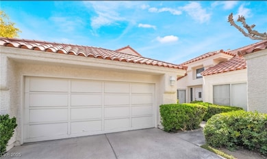 View of front facade featuring concrete driveway,