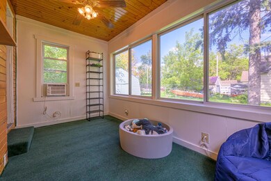 Home features a four-season porch that brings in a lot of natural light!
