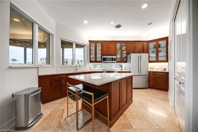Kitchen featuring plenty of natural light, sink, a