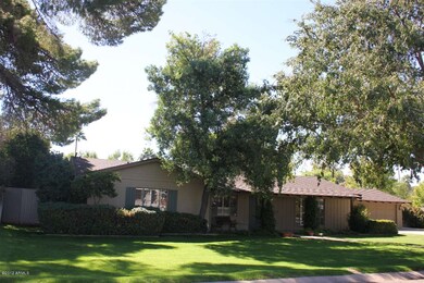 .Lush lawns and lots of big trees