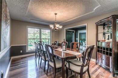 View from dining room showing front door and a pea