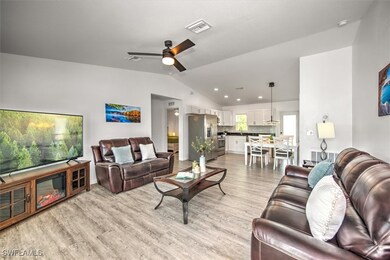 Living area featuring light wood finished floors,