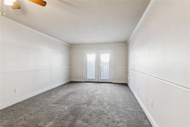 french doors lead to private patio