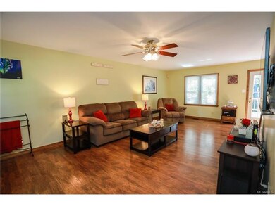 Large Family Room with Engineered wood style floor