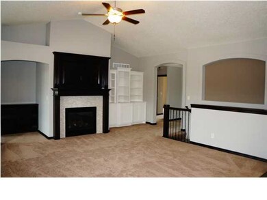 LIVING ROOM FEATURES GREAT PLACEMENT OF THE FIREPL