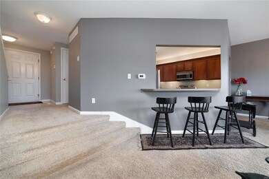 Bar area is perfect for entertaining guests from the kitchen.