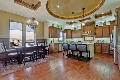 There is room to eat at the island in the kitchen 