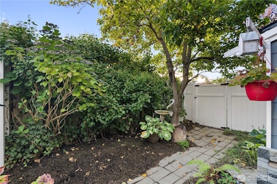 Mature landscaping providing dappled sunlight and inviting wildlife.