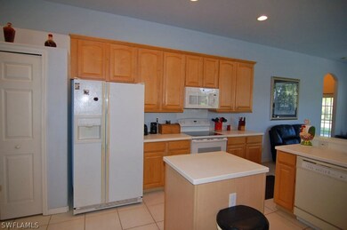 Pantry, island and plenty of cabinets in this kitc