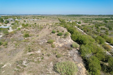 Aerial overview of property's location with rural landscape