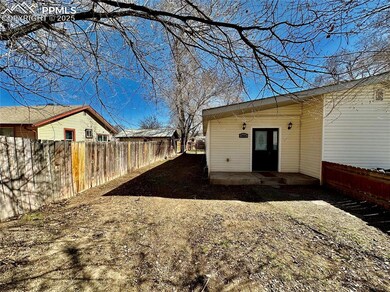 Back of house with a patio area and a fenced backy